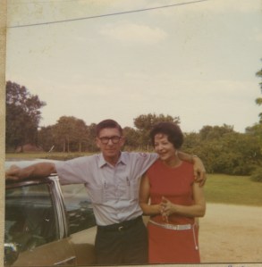 Aunt & Uncle with dirt road behind them